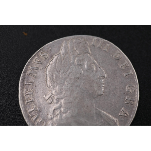 73 - William the 3rd 1697 silver crown a bit bent and worn