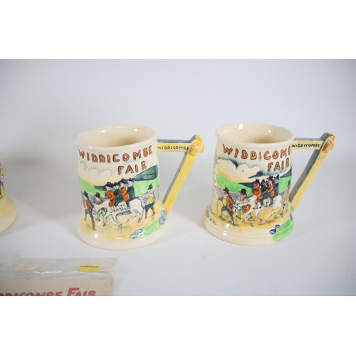 83 - Collection of Widdicombe fair jugs and mugs plus 1 musical