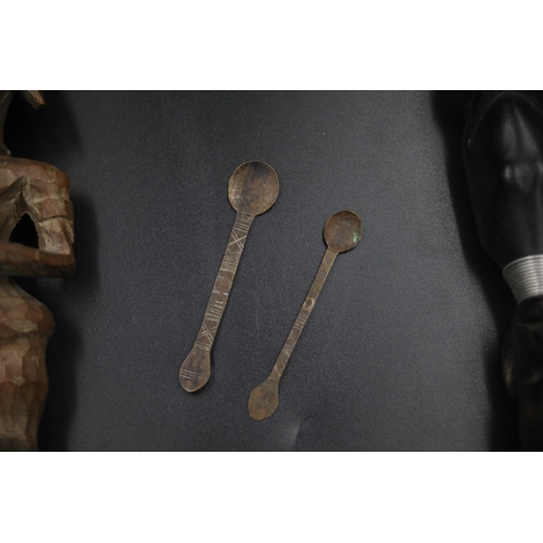 86 - Various African items including 2 Ashanti gold dust spoons solid carved head with earrings and carve... 