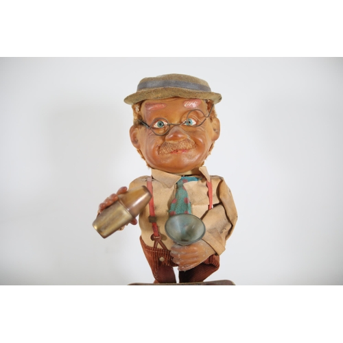 9 - 1950's Japanese tin toy charley weaver bartender ( needs a clean ) but in lovely condition