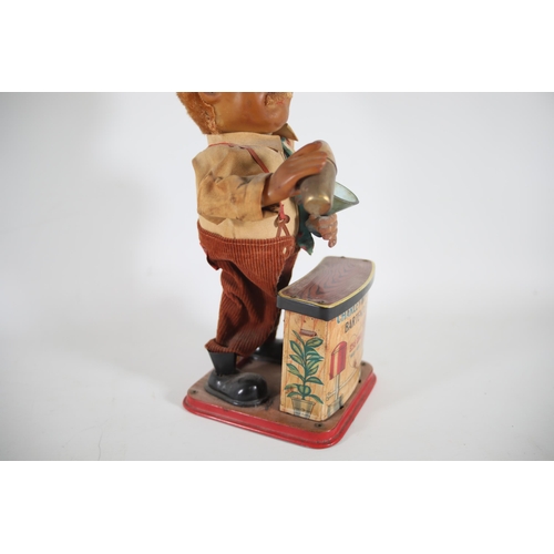 9 - 1950's Japanese tin toy charley weaver bartender ( needs a clean ) but in lovely condition