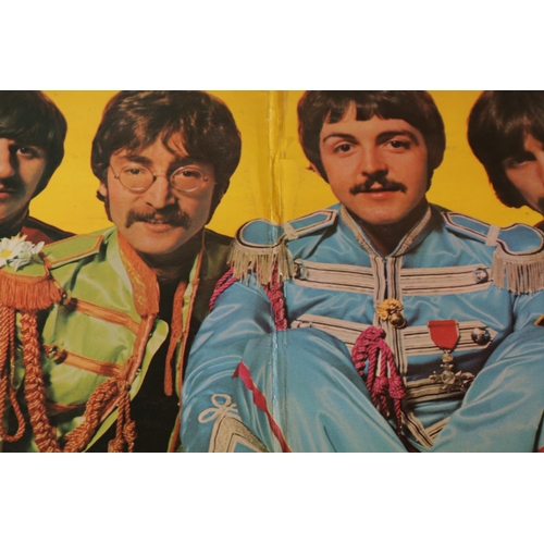 11 - Beatles Sgt Peppers Lonely Hearts Club Band PCS 7027 with cut-out. The cover remains in good order, ... 