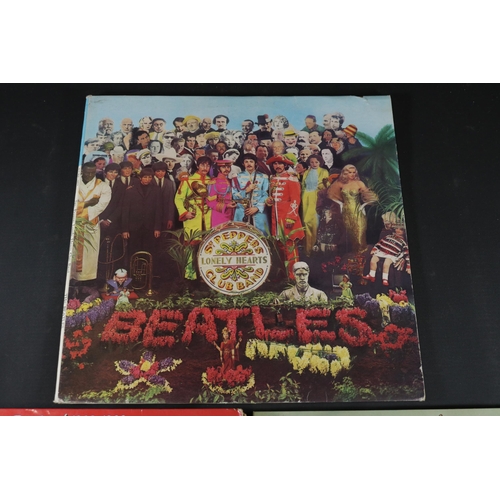 17 - A small collection of Beatles Albums, including Sgt Peppers Lonely Hearts Club Band with Cut Out, Th... 