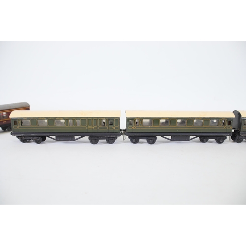 183 - 14 Tin Plate Carriages OO Gauge. 2x Hornby Dublo. All of the carriages look to be in average used co... 