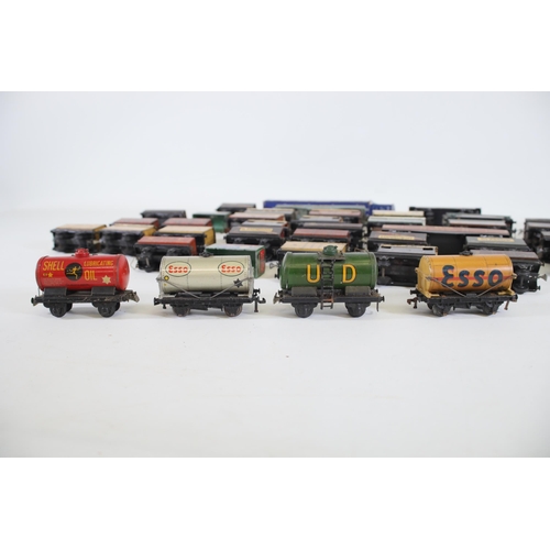 184 - Large selection of tin plate 00 Gauge Goods Carriers and Wagons some of which are Hornby / Meccano, ... 