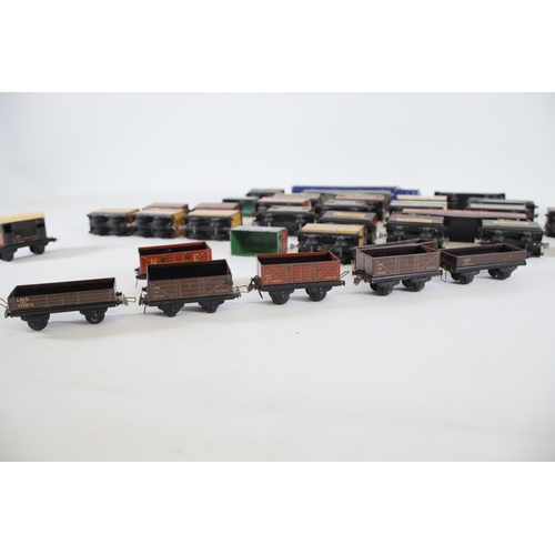 184 - Large selection of tin plate 00 Gauge Goods Carriers and Wagons some of which are Hornby / Meccano, ... 