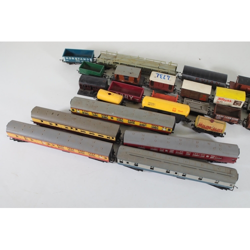 185 - Selection of OO Gauge carriages oil containers and good wagons mostly Triang Hornby, Grafar and Lima... 