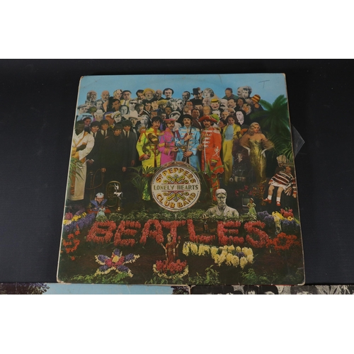 19 - A collection of Beatles Albums, Revolver shows some age related wear to the cover. PMC7009, on side ... 