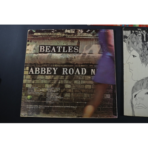 19 - A collection of Beatles Albums, Revolver shows some age related wear to the cover. PMC7009, on side ... 