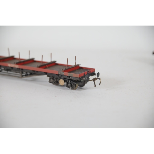 205 - 4 Bachmann Bogie Bolster Rail freights Wagons. 3 are missing pins and 1 has had a connector replaced... 