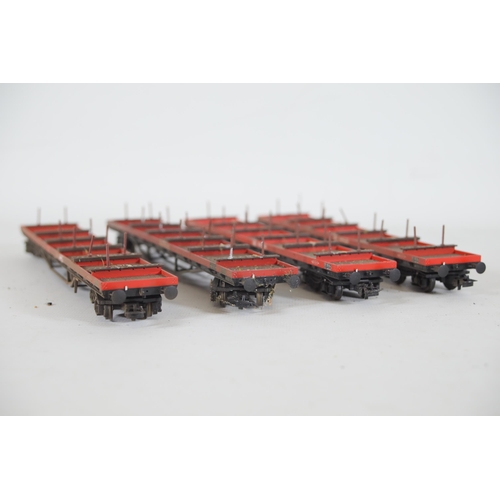 205 - 4 Bachmann Bogie Bolster Rail freights Wagons. 3 are missing pins and 1 has had a connector replaced... 