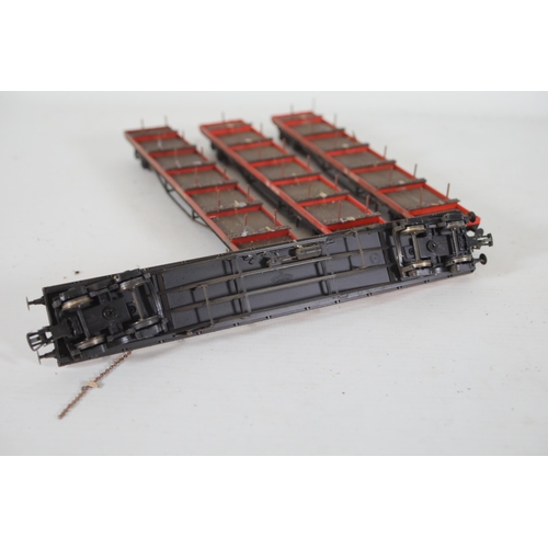 205 - 4 Bachmann Bogie Bolster Rail freights Wagons. 3 are missing pins and 1 has had a connector replaced... 