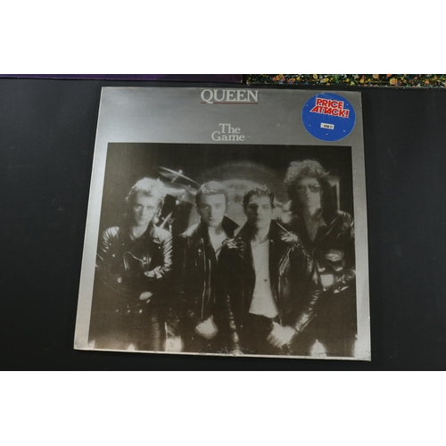 21 - A small collection of Queen Vinyl's, including 