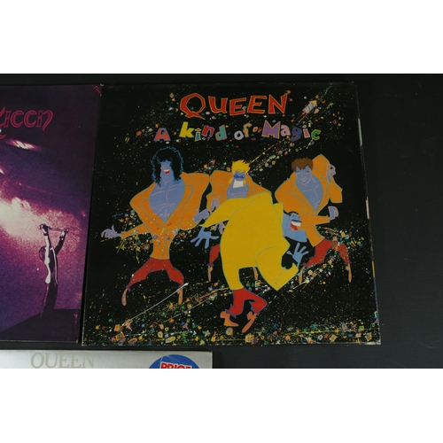 21 - A small collection of Queen Vinyl's, including 