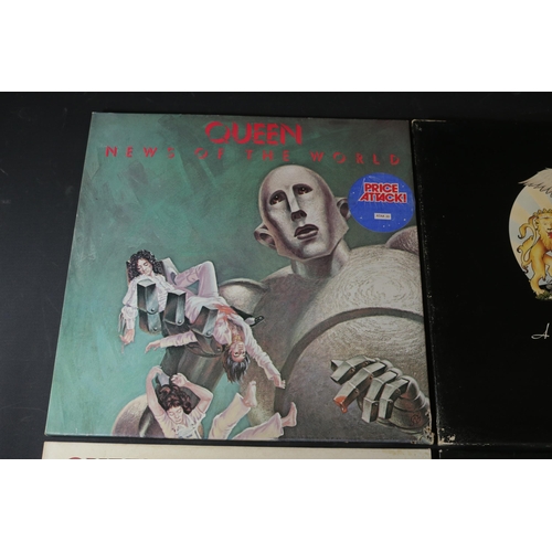 25 - A collection of Four Queen Albums, including Queen Sheer Heart Attack EMC 3061. The cover and interi... 