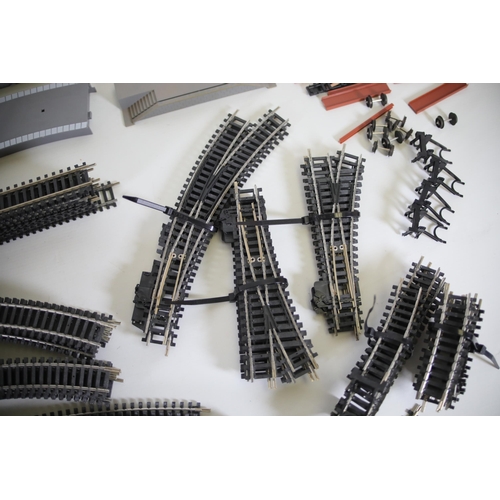 252 - Good amount of various OO gauge Track with a platform all Hornby