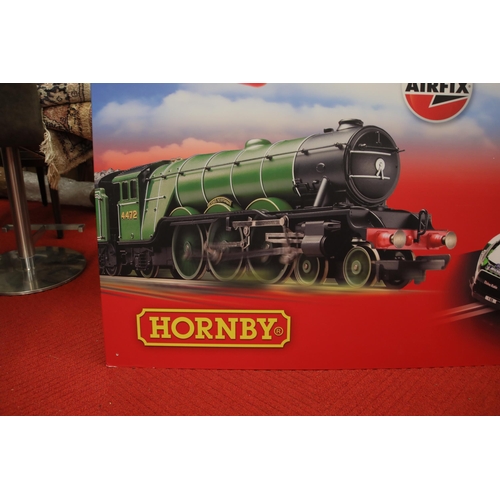 255 - Large Hornby corgi and Airfix advertising board 160cm wide 120cm high. Ideal for a collectors wall o... 