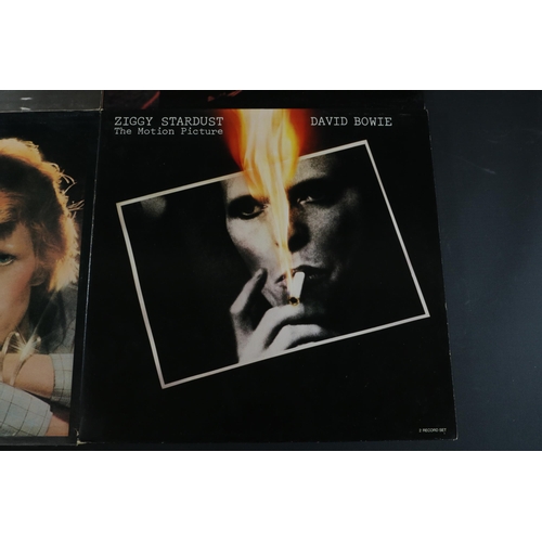 26 - A Collection of Four David Bowie LPs, including Young Americans. RS1006 Stereo, the cover has some g... 