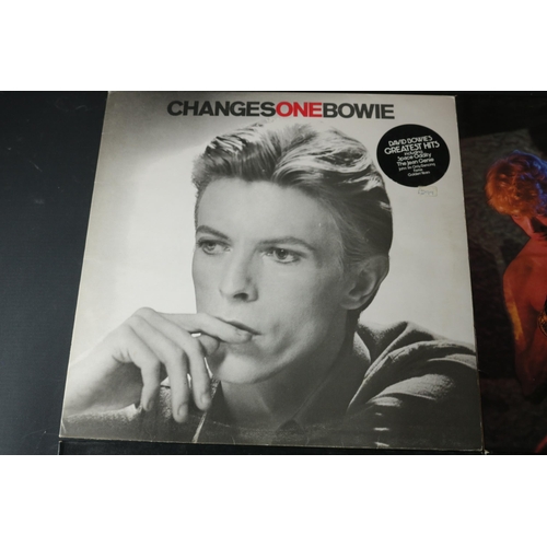 26 - A Collection of Four David Bowie LPs, including Young Americans. RS1006 Stereo, the cover has some g... 