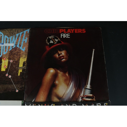 27 - A small collection of Vinyl, including David Bowie Lets Dance AML 3029, Ohio Players Fire Deluxe 910... 