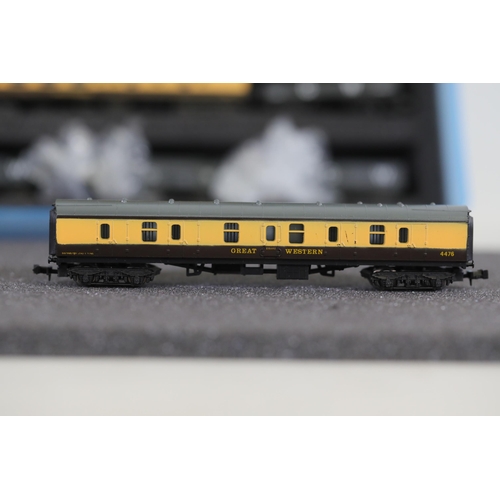 276 - N gauge coaches and goods transportation wagons in display case. 2 Lima coaches great western brown ... 