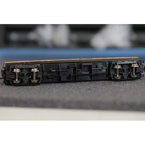 276 - N gauge coaches and goods transportation wagons in display case. 2 Lima coaches great western brown ... 