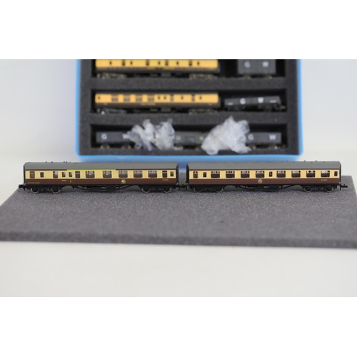 276 - N gauge coaches and goods transportation wagons in display case. 2 Lima coaches great western brown ... 