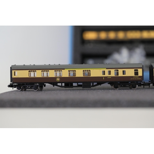 276 - N gauge coaches and goods transportation wagons in display case. 2 Lima coaches great western brown ... 