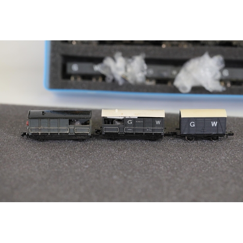 276 - N gauge coaches and goods transportation wagons in display case. 2 Lima coaches great western brown ... 