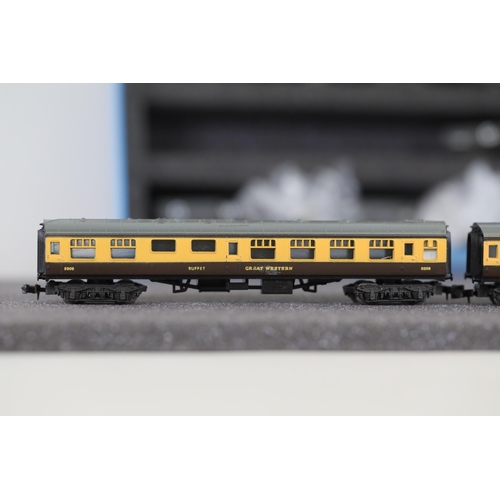 276 - N gauge coaches and goods transportation wagons in display case. 2 Lima coaches great western brown ... 