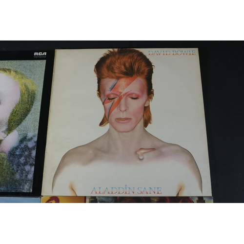 28 - A collection of Four David Bowie albums, all in great condition. Some minor age related wear to cove... 