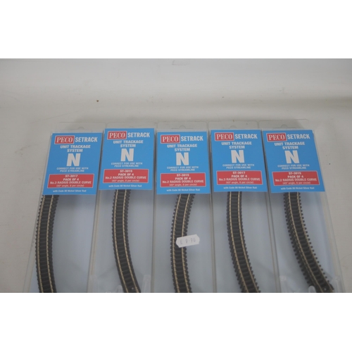 284 - Good selection of brand new and boxed Peco N gauge train track. 5x Peco setrack ST 3015 pack of 4 no... 