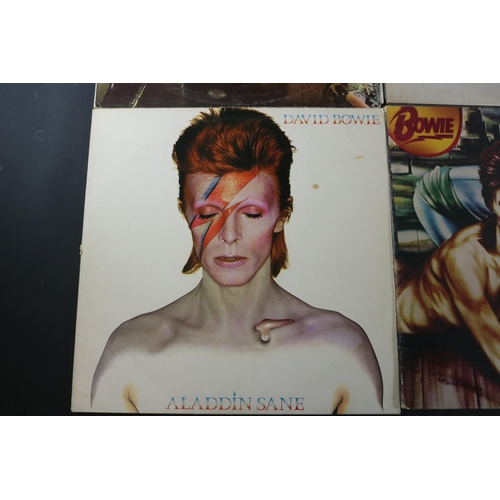 29 - A collection of Four David Bowie Albums. Aladdin Sane RS1001, cover and sleeve in good clean conditi... 