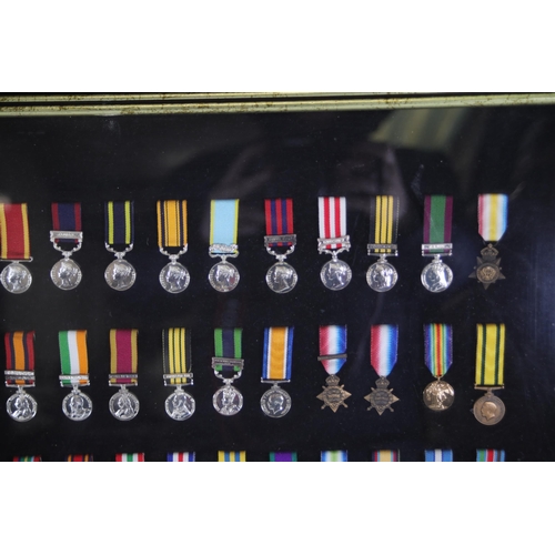 409 - A collection of framed British Campaign and Gallantry Medals, 65cm x 48cm, all in Mint Condition