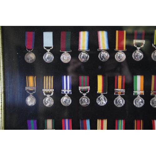 409 - A collection of framed British Campaign and Gallantry Medals, 65cm x 48cm, all in Mint Condition