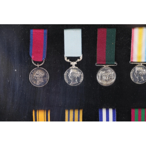 409 - A collection of framed British Campaign and Gallantry Medals, 65cm x 48cm, all in Mint Condition