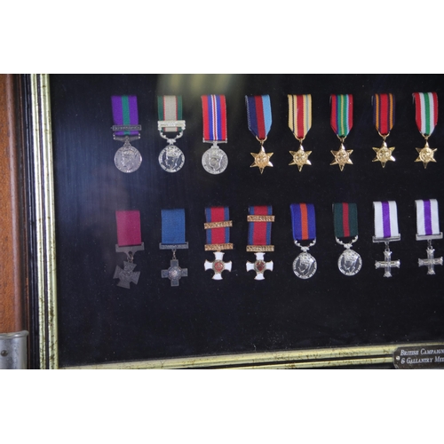 409 - A collection of framed British Campaign and Gallantry Medals, 65cm x 48cm, all in Mint Condition