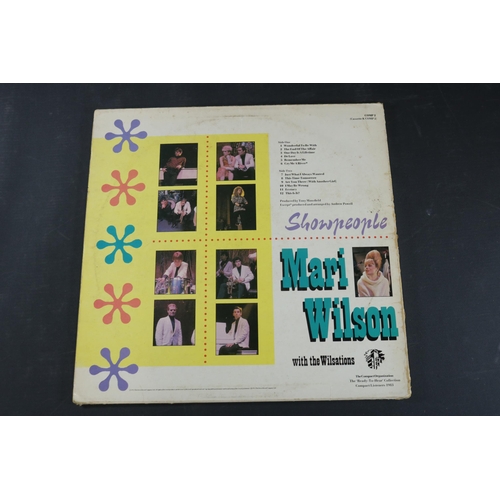 41 - A signed copy of Mari Wilson Show people. The exterior sleeve has some age to note, most specificall... 