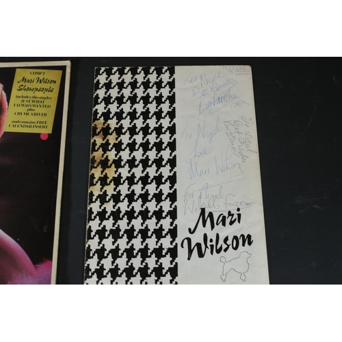 41 - A signed copy of Mari Wilson Show people. The exterior sleeve has some age to note, most specificall... 