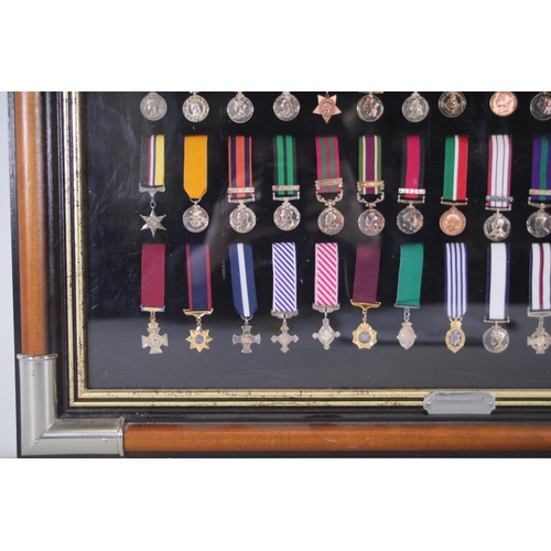 411 - A collection of framed British Campaign and Gallantry Medals in a Frame, 65cm x 48cm, all in Mint Co... 