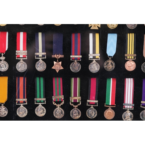 411 - A collection of framed British Campaign and Gallantry Medals in a Frame, 65cm x 48cm, all in Mint Co... 