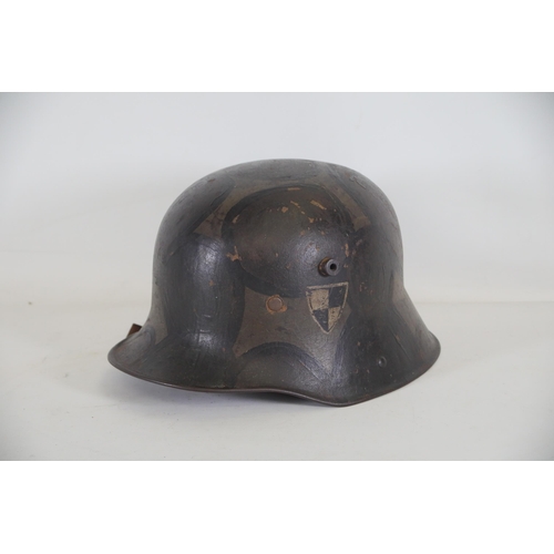 416 - World War 1 Stahlhelm M1916. As you look at the helmet on the inside right it has T666 stamped into ... 