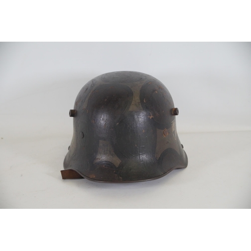 416 - World War 1 Stahlhelm M1916. As you look at the helmet on the inside right it has T666 stamped into ... 