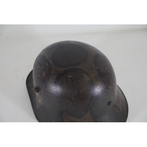 416 - World War 1 Stahlhelm M1916. As you look at the helmet on the inside right it has T666 stamped into ... 