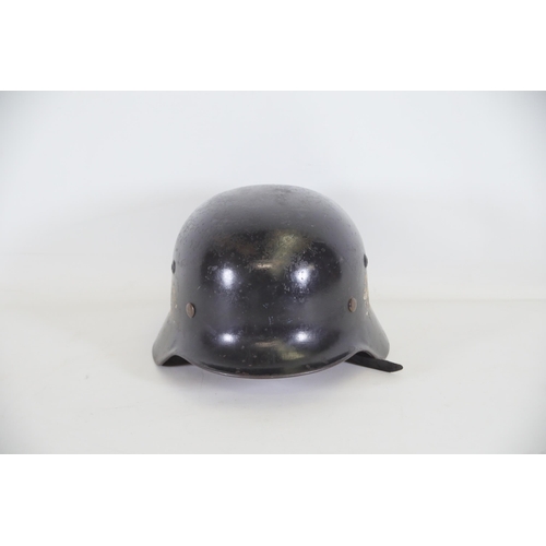 417 - Black World War 2 M1935 German Helmet, Tiger decals to the side. Stamped Q04 on the inside and 3061 ... 