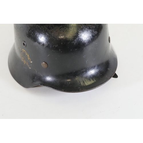 417 - Black World War 2 M1935 German Helmet, Tiger decals to the side. Stamped Q04 on the inside and 3061 ... 