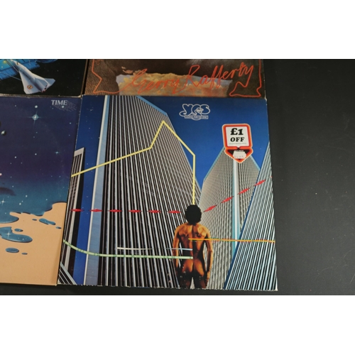 42 - A collection of Four vinyl albums, including Yes, Electric Light Orchestra and Gerry Rafferty. Gerry... 