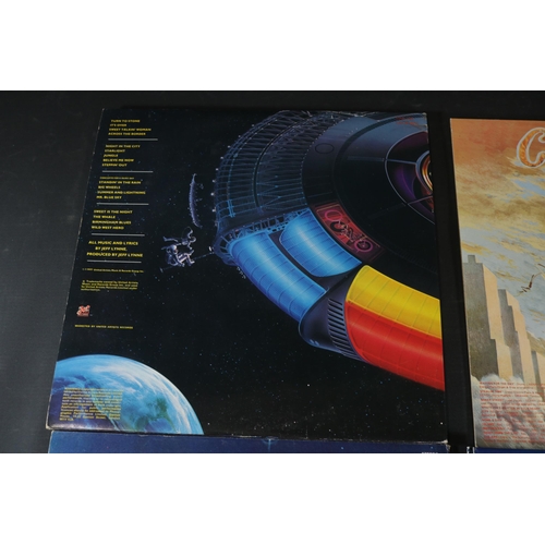 42 - A collection of Four vinyl albums, including Yes, Electric Light Orchestra and Gerry Rafferty. Gerry... 