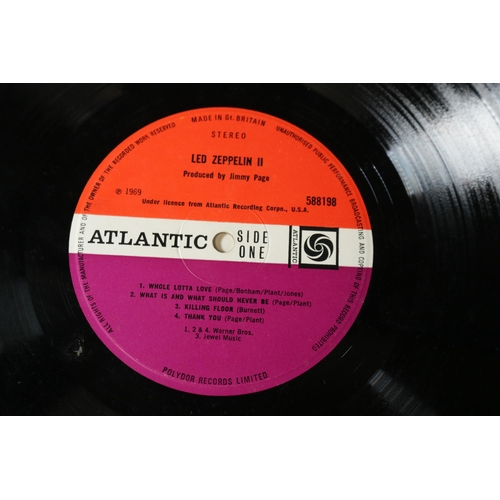 49 - Two Vinyl Albums including The Clash and Led Zeppelin II. Led Zeppelin II is a gatefold copy, the co... 