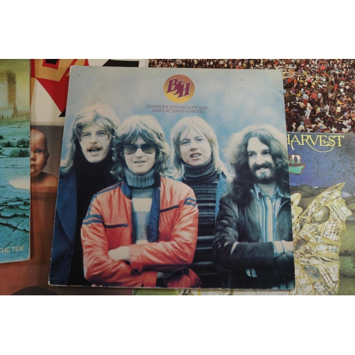 59 - In total, a collection of 11 Barclay James Harvest Albums. Titles include 